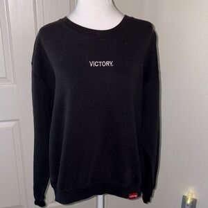 The Marathon Clothing Black faded Victory Crew Neck Sweater.